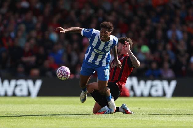Football - 2025 2026 Premier League - AFC Bournemouth vs Brighton & Hove Albion - Vitality Stadium - Saturday 13th September 2025 Marcos Senesi of Bournemouth fouls Georginio Rutter of Brighton during the Premier League match at the Vitality Stadium COLORSPORT Shaun Boggust 