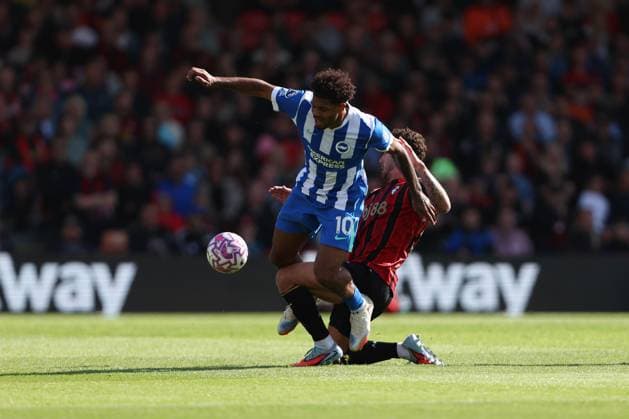 Football - 2025 2026 Premier League - AFC Bournemouth vs Brighton & Hove Albion - Vitality Stadium - Saturday 13th September 2025 Marcos Senesi of Bournemouth fouls Georginio Rutter of Brighton during the Premier League match at the Vitality Stadium COLORSPORT Shaun Boggust 