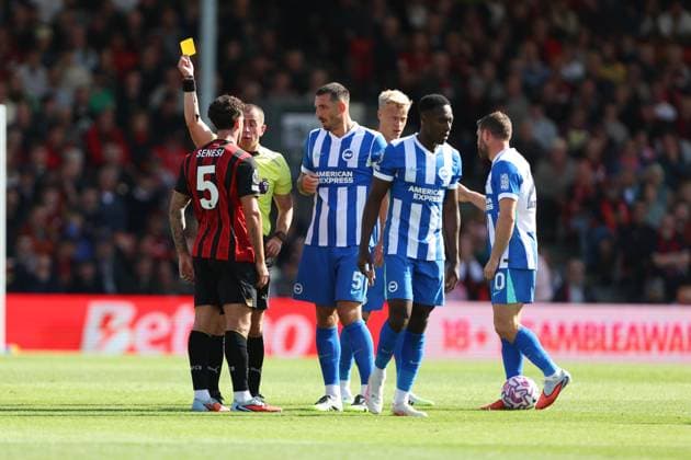Football - 2025 2026 Premier League - AFC Bournemouth vs Brighton & Hove Albion - Vitality Stadium - Saturday 13th September 2025 Marcos Senesi of Bournemouth receives a yellow card from Referee Mr Peter Banks during the Premier League match at the Vitality Stadium COLORSPORT Shaun Boggust 