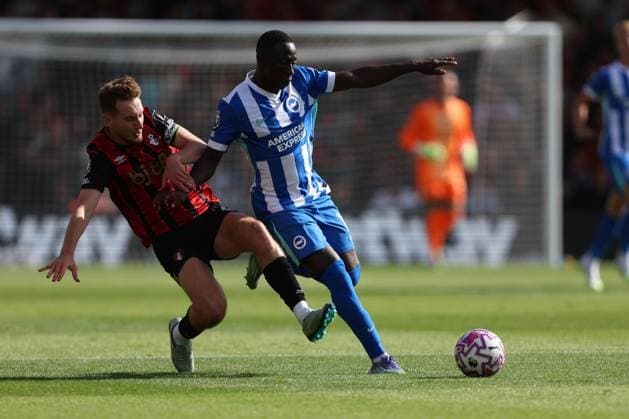 Football - 2025 2026 Premier League - AFC Bournemouth vs Brighton & Hove Albion - Vitality Stadium - Saturday 13th September 2025 David Brooks of Bournemouth lunges in and fouls Yankuba Minteh of Brighton during the Premier League match at the Vitality Stadium COLORSPORT Shaun Boggust 