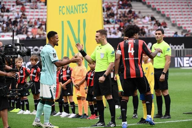 OGC Nice v FC Nantes - Ligue 1 McDonald s 2025 2026 98 Kelvin AMIAN (fcn) - Guillaume PARADIS (ARBITRE) during the Ligue 1 McDonald s match between Nice and Nantes at Allianz Riviera on September 13, 2025 in Nice, France. Nice France  Copyright: xFEPx 776348123