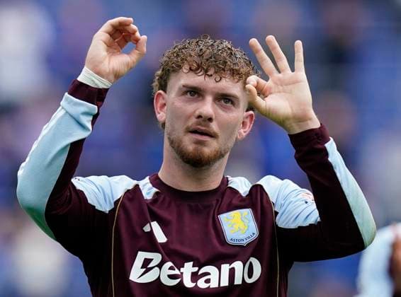 Liverpool, England, 13th September 2025. Harvey Elliott of Aston Villa gestures to the Everton fans during the Everton vs Aston Villa Premier League match at Hill Dickinson Stadium, Liverpool. Picture credit should read: Andrew Yates Sportimage EDITORIAL USE ONLY. No use with unauthorised audio, video, data, fixture lists, club league logos or live services. Online in-match use limited to 120 images, no video emulation. No use in betting, games or single club league player publications. SPI_017_AY_EVERTON_VILLA SPI-4134-0017