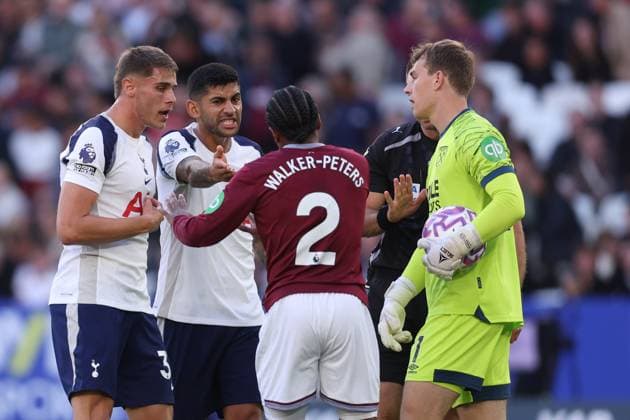 London, England, 13th September 2025. Cristian Romero (2nd L) of Tottenham Hotspur appeals to the referee after his goal is disallowed during the West Ham United vs Tottenham Hotspur Premier League match at the London Stadium, London. Picture credit should read: Paul Terry Sportimage EDITORIAL USE ONLY. No use with unauthorised audio, video, data, fixture lists, club league logos or live services. Online in-match use limited to 120 images, no video emulation. No use in betting, games or single club league player publications. SPI_010_PT_West_Ham_Tottenham SPI-4133-0010