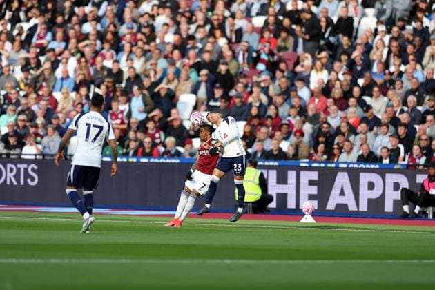 13th September 2025; London Stadium, London, England; Premier League Football, West Ham United versus Tottenham Hotspur; Pedro Porro of Tottenham Hotspur heads the ball above Crysencio Summerville of West Ham United  JohnxPatrickxFletcher