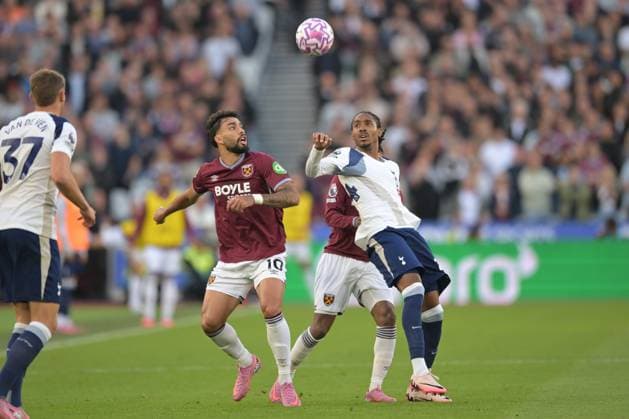 West Ham vs Spurs Premier League Lucas Paqueta of West Ham United clashes with Djed Spence of Tottenham Hotspur during the West Ham vs Tottenham Hotspur Premier League match at the London Stadium Stratford. London The London Stadium UK Copyright: xMartinxDaltonx WestHam_vs_Spurs_130915_MD_225