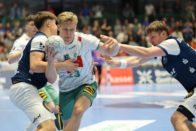 GER, 1.HBL. bergischer HC vs. GWD Minden 13.09.2025, Unihalle, Wuppertal, GER, 1.HBL. bergischer HC vs. GWD Minden, im Bild: Niclas Heitkamp (TBV Lemgo 23), im Zweikampf gegen Gerdas Barbarskas (BHC 14), Soeren Steinhaus ( BHC 53),