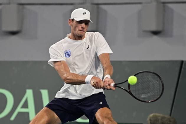 Davis Cup - Stefanos SAKELLARIDIS of Greece (white) in action against Joao FONSECA of Brasil (dark blue) during the Davis Cup World Group 1st Round tennis match between Greece and Brasil held in OAKA Stadium in Athens, Greece, 13 September 2025. IMAGO ONE INCH PRODUCTIONS ATHENS Greece Copyright: xONExINCHxPRODUCTIONSx 6654455