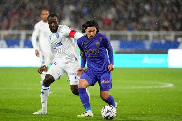 AJ Auxerre v AS Monaco - Ligue 1 McDonald s 2025 2026 42 Elisha OWUSU (aja) - 18 Takumi MINAMINO (asm) during the Ligue 1 McDonald s match between Auxerre and Monaco at Stade Abbe Deschamps on September 13, 2025 in Auxerre, France. Auxerre France  Copyright: xFEPx 776348121
