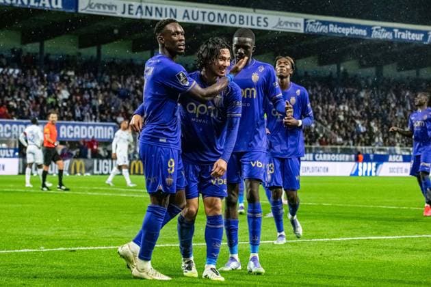 FOOTBALL : AJ Auxerre vs AS Monaco - Ligue 1 - JournÃ e 4 - 13 09 2025 Joie des joueurs de l™AS Monaco aprÃ s le but de Takumi Minamino (AS Monaco) AuxerreFrance  Copyright: xBaptistexAutissierx