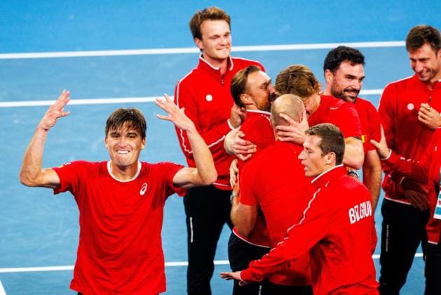 Belgian Raphael Collignon and celebrates with his team after winninga a tennis match between Belgian Collignon and Australian Thompson, during the qualifier of the Davis Cup, Sunday 14 September 2025, in Sydney, Australia. Belgium and Australia will compete this weekend in the second round of the Davis Cup qualifiers. PATRICKxHAMILTON  x134207858x