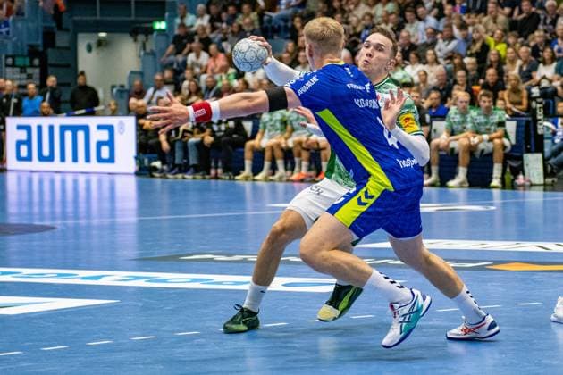 Daikin Handball Bundesliga, VfL Gummersbach - Füchse Berlin 14.09.2025 Ellidi Vidarsson (VfL Gummersbach, 4), Lasse Bredekjær Andersson (Füchse Berlin, 11),; Daikin Handball Bundesliga, VfL Gummersbach - Füchse Berlin 14.09.2025 Copyright: xBEAUTIFULxSPORTS Erlhofx