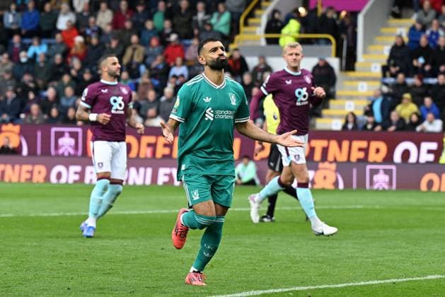 Mohamed Salah of Liverpool celebrates after scoring the team s first goal from a penalty Burnley v Liverpool, Premier League, Football, Turf Moor, Burnley, UK - 14 Sept 2025Burnley Turf Moor United Kingdom EDITORIAL USE ONLY No use with unauthorised audio, video, data, fixture lists, club league logos or live services. Online in-match use limited to 120 images, no video emulation. No use in betting, games or single club league player publications. Copyright: xAnnaxGowthorpe Shutterstockx 15481319ac
