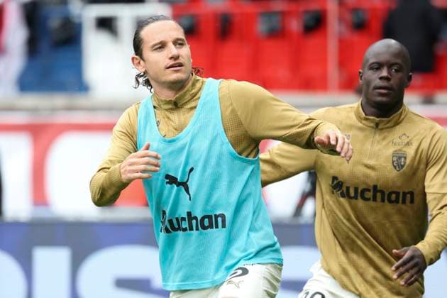 FOOTBALL : Paris Saint Germain Vs RC Lens - Ligue 1 - 14 09 2025 Florian Thauvin (RC Lens) - Malang Sarr (RC Lens) ParisFrance  Copyright: xMichtofx