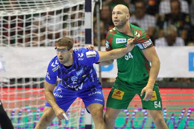 14.09.2025, xtgx, SC Magdeburg - TVB Stuttgart v.l. Antonio Seradilla (Stuttgart, 5), Oscar Bergendahl (Magdeburg, 54) Zweikampf, Duell, Kampf, tackle Magdeburg