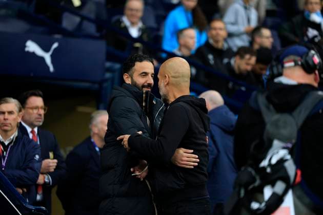Manchester City v Manchester United, ManU Premier League 14 09 2025. Ruben Amorim the Manchester United manager and Pep Guardiola the Manchester City manager embrace ahead of the Premier League match between Manchester City and Manchester United at the Etihad Stadium, Manchester, England on 14 September 2025. Manchester Etihad Stadium Manchester England Editorial use only DataCo restrictions apply See www.football-dataco.com , Copyright: xConorxMolloyx PSI-22824-0017