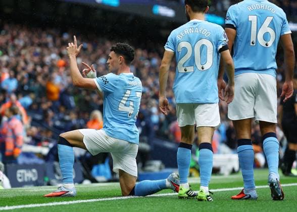 Phil Foden of Manchester City celebrates scoring the opening goal Manchester City v Manchester United, ManU Premier League, Football, Etihad Stadium, Manchester, UK - 14 Sept 2025Manchester Etihad Stadium United Kingdom EDITORIAL USE ONLY No use with unauthorised audio, video, data, fixture lists, club league logos or live services. Online in-match use limited to 120 images, no video emulation. No use in betting, games or single club league player publications. Copyright: xMattxWest Shutterstockx 15481325af