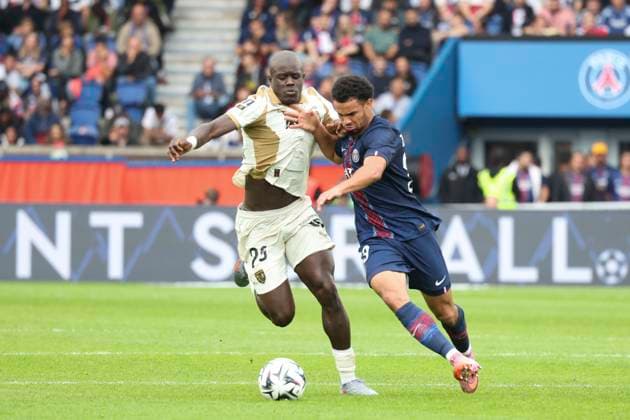 FOOTBALL : Paris Saint Germain Vs RC Lens - Ligue 1 - 14 09 2025 Malang Sarr (RC Lens) Vs Warren Zaire-Emery (PSG) ParisFrance  Copyright: xMichtofx