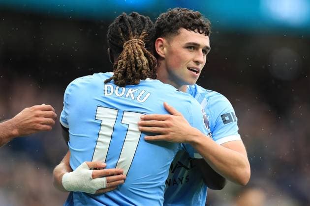 14th September 2025; Etihad Stadium, Manchester, England; Premier League Football, Manchester City versus Manchester United, ManU Phil Foden of Manchester City celebrates with team mate Jeremy Doku after scoring with a header for 1-0 after 18 minutes  DavidxBlunsden