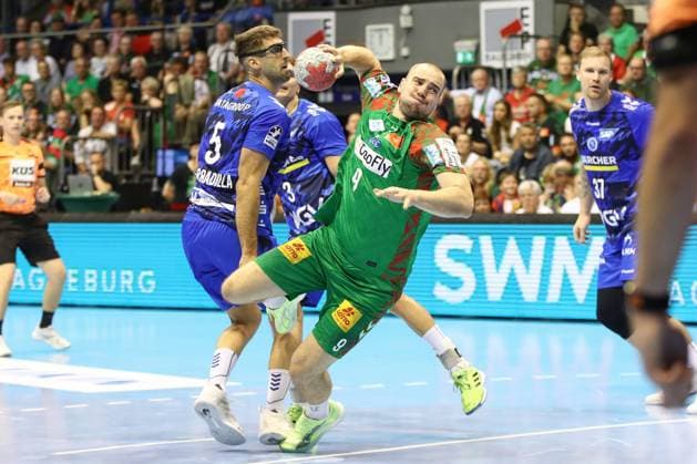 14.09.2025, xgox, Handball - Daikin HBL SC Magdeburg - TVB Stuttgart emspor, v.l. Tim Zechel (Magdeburg, 9) wirft Tor, Torschuetze, erzielt Tor, Treffer, scores the goal Magdeburg
