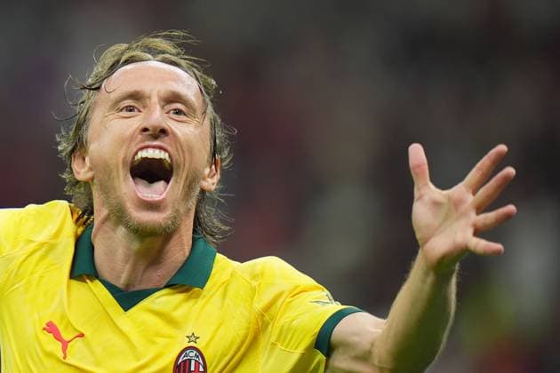 AC Milan s Luka Modric celebrates after scoring 1-0 during the Serie A soccer match between Milan and Bologna at the San Siro Stadium in Milan , north Italy - Sunday , September 14 , 2025. - Soccer .  Copyright: xSpada LaPressex