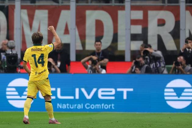 Milan, Italy, 14th September 2025. Luka Modric of AC Milan celebrates after scoring to give the side a 1-0 lead during the AC Milan vs Bologna Serie A match at Giuseppe Meazza, Milan. Picture credit should read: Jonathan Moscrop Sportimage EDITORIAL USE ONLY. No use with unauthorised audio, video, data, fixture lists, club league logos or live services. Online in-match use limited to 120 images, no video emulation. No use in betting, games or single club league player publications. SPI_019_JM_MILAN_BOLOGNA_ SPI-4120-0019