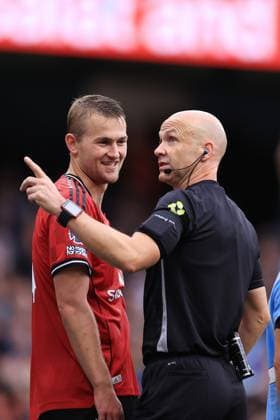 Football - Premier League - Manchester City v Manchester United, ManU 14th September 2025 - Premier League - Manchester City v Manchester United - Referee Anthony Taylor speaks to Matthijs de Ligt of Manchester United - Photo: Simon Stacpoole Offside. Manchester UK Copyright: xSimonxStacpoolexOffside