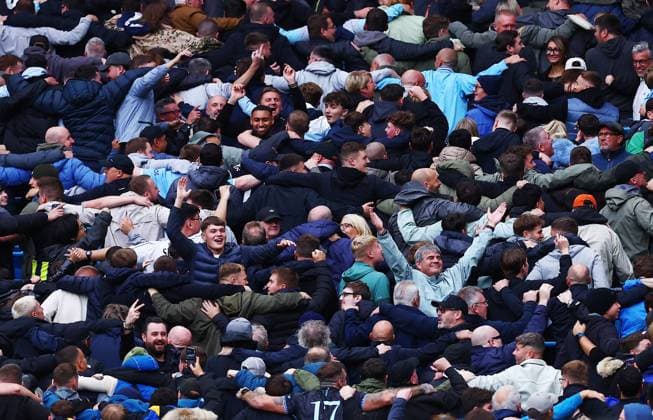 Manchester City fans perform a Poznan celebration Manchester City v Manchester United, ManU Premier League, Football, Etihad Stadium, Manchester, UK - 14 Sept 2025Manchester Etihad Stadium United Kingdom EDITORIAL USE ONLY No use with unauthorised audio, video, data, fixture lists, club league logos or live services. Online in-match use limited to 120 images, no video emulation. No use in betting, games or single club league player publications.  Copyright: xMattxWest Shutterstockx 15481325eg