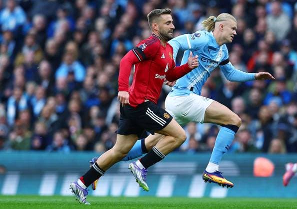 Erling Haaland of Manchester City and Luke Shaw of Manchester United, ManU Manchester City v Manchester United, Premier League, Football, Etihad Stadium, Manchester, UK - 14 Sept 2025Manchester Etihad Stadium United Kingdom EDITORIAL USE ONLY No use with unauthorised audio, video, data, fixture lists, club league logos or live services. Online in-match use limited to 120 images, no video emulation. No use in betting, games or single club league player publications.  Copyright: xMattxWest Shutterstockx 15481325dm
