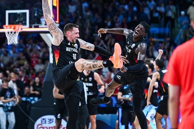 Turkey v Germany: Final - FIBA EuroBasket 2025 Daniel Theis and Isaac Bonga of Germany celebrate the victory during the FIBA EuroBasket 2025 Final between Turkiye and Germany at Xiaomi Arena in Riga, Latvia, on September 14, 2025. Riga Latvia  Copyright: xStefanosxKyriazisx originalFilename:kyriazis-trkiyevg250914_npOZ8.jpg