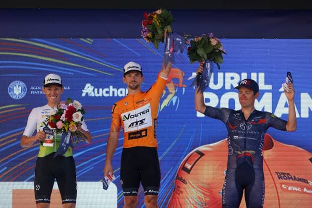 (250915) -- ROMANIA, Sept. 15, 2025 -- Radoslaw Fratczak (C) of Poland celebrates on the podium after winning the last stage of Tour of Romania 2025 cycling race in Bucharest, Romania, Sept. 14, 2025. (Photo by Xinhua) (SP)ROMANIA-BUCHAREST-CYCLING TOUR OF ROMANIA CristianxCristel 