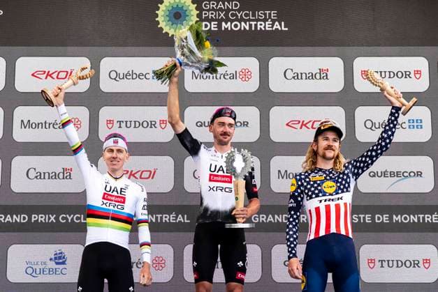 September 14, 2025, Montreal, Qc, Canada: First place winner Brandon McNulty from the USA, centre, second place winner Tadej Pogacar, of Slovenia, left, and third place winner Quinn Simmons, of the USA, celebrate on the podium following UCI Montreal Grand Prix Cycling race action in Montreal on Sunday, Sept. 14, 2025. Montreal Canada  - ZUMAc35_ 20250914_zaf_c35_101 Copyright: xChristopherxKatsarovx Canada News - September 14, 2025  - ZUMA0833 0833703495st Copyright: xIMAGO ChristopherxKatsarovx