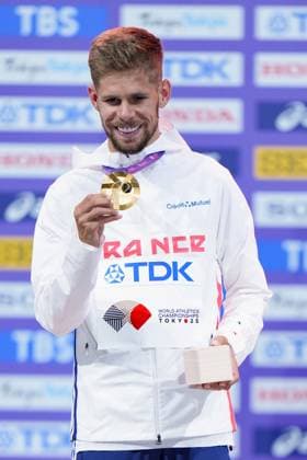 Athletics: World championships in Tokyo Gold medalist Jimmy Gressier of France poses for a photo on the podium during the medal ceremony for the men s 10,000-meter event at the World Athletics Championships at the National Stadium in Tokyo on Sept. 15, 2025.  A14AA0004851319P