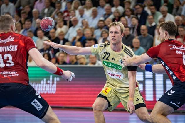 DAIKIN HBL: SG Flensburg-Handewitt vs TSV Hannover-Burgdorf; 15.09.25 Marian Michalczik (Nr.22, TSV Hannover-Burgdorf) im Angriff DAIKIN HBL: SG Flensburg-Handewitt vs TSV Hannover-Burgdorf, GP JOULE Arena Flensburg am 15.09.25 Copyright: xBEAUTIFULxSPORTS MarioxM.xKobergx