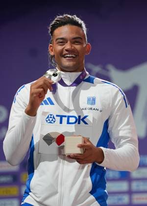 (250916) -- TOKYO, Sept. 16, 2025 -- Silver medalist Emmanouil Karalis (L) of Greece poses during the men s pole vault awarding ceremony at the 2025 World Athletics Championships in Tokyo, Japan, Sept. 16, 2025. ) (SP)JAPAN-TOKYO-ATHLETICS-WORLD ATHLETICS CHAMPIONSHIPS-MEN S POLE VAULT-AWARDING CEREMONY JiangxHan 