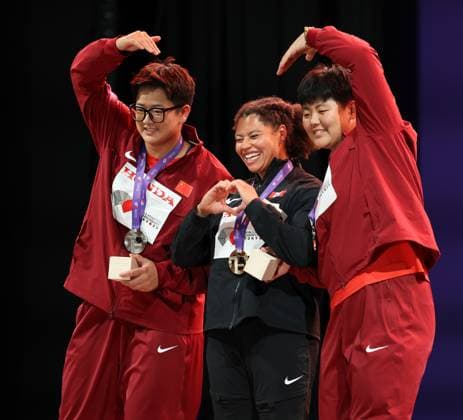 September 16, 2025, Shinjuku, Tokyo, Japan: CAMRYN ROGERS of Canada (center), Jie ZHAO (left) and Jiale ZHANG (right) celebrate with their Gold, Silver and Bronze Medal in the Women s Hammer Throw Medal Ceremony at the Tokyo 2025 World Athletics Championships in Tokyo, Japan Shinjuku Japan - ZUMAc179 20250916_zep_c179_075 Copyright: xMickaelxChavetx