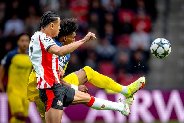 PSV Eindhoven defender Armando Obispo, Union Saint-Gilloise forwarder Kevin Rodriguez during the match PSV - Royale Union Saint-Gilloise at the Philips stadium for the Champions League - League phase - Matchday 1 season 2025-2026 in EINDHOVEN, Netherlands on 16 september 2025, (photo by Marcel van Dorst EYE4images DeFodi Images)