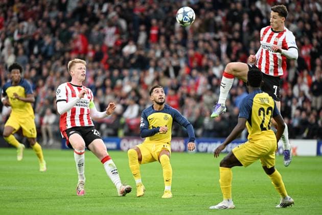 250916 PSV - Royale Union Saint-Gilloise Jerdy Schouten of PSV pictured with Anouar Ait El Hadj of Union Saint-Gilloise, Ruben van Bommel of PSV and Ousseynou Niang of Union Saint-Gilloise during the UEFA Champions League season 2025 - 2026 League phase matchday 1 football game between PSV and Royale Union Saint-Gilloise on September 16 , 2025 in Eindhoven, Netherlands. (Photo by Maarten Straetemans Isosport) Eindhoven Netherlands  Copyright: xMaartenxStraetemansx UCL_PSV-UNION_20250916_036