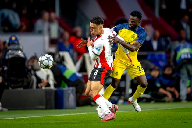 Union Saint-Gilloise midfielder Ousseynou Niang, PSV Eindhoven defender Sergino Dest during the match PSV - Royale Union Saint-Gilloise at the Philips stadium for the Champions League - League phase - Matchday 1 season 2025-2026 in EINDHOVEN, Netherlands on 16 september 2025, (photo by Marcel van Dorst EYE4images DeFodi Images)