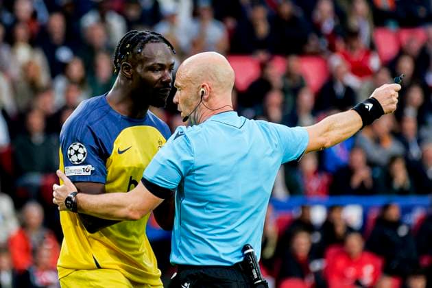 Referee Anthony Taylor is in discussion with Promise David of Royale Union Saint-Gilloise PSV Eindhoven v Royale Union Saint-Gilloise, , UEFA Champions League 2025 26 League Phase MD1 - PSV Eindhoven v Royale Union Saint-Gilloise, Philips Stadion, September 16, 2025, Eindhoven, Netherlands.
