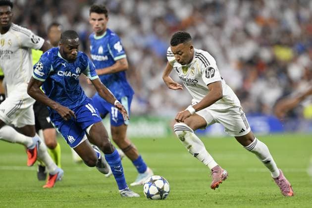 Real Madrid v Olympique de Marseille - UEFA Champions League MADRID, SPAIN - SEPTEMBER 16: Real Madrid’s Kylian Mbappe (R) battles for the ball with Olympique de Marseille’s Geoffrey Kondogbia (L) during the UEFA Champions League group stage match between Real Madrid and Olympique de Marseille at Santiago Bernabeu Stadium in Madrid, Spain on September 16, 2025. Burak Akbulut Anadolu Madrid Spain. Editorial use only. Please get in touch for any other usage.  Copyright: x2025xAnadoluxBurakxAkbulutx