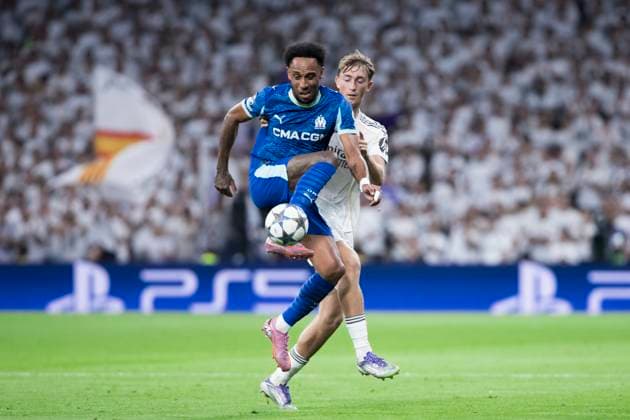 UEFA champions league - Real Madrid vs Marseille MADRID, SPAIN - September 16: Pierre Emrick Aubameyang of Marseille and Dean Huijsen of Real Madrid fight for the ball during the UEFA champions league 2025 26 match between Real Madrid and Marseille at Santiago Bernabeu Stadium. (Photo by Guillermo Martinez) Madrid Santiago Bernabeu Stadium Spain Copyright: xGuillermoxMartinezx