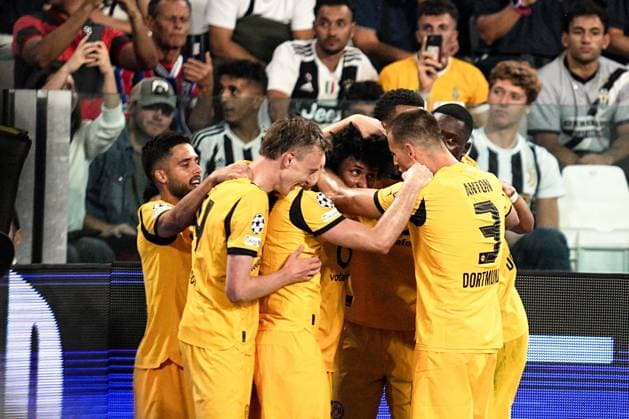 Dortmund s Karim Adeyemi celebrates after scoring the 1-0 goal for his team during the Uefa Champions League soccer match, between Juventus and Borussia Dortmund at the Allianz Stadium in Turin, north west Italy - Tuesday, September 16, 2025. - Soccer  Copyright: xMarcoxAlpozzi LaPressex