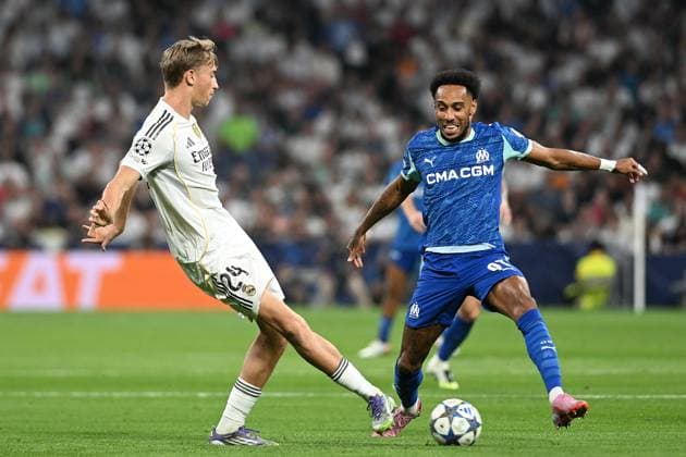 Real Madrid CF s Dean Huijsen (l) and Olympique de Marseille s Pierre-Emerick Aubameyang during Champions League 2024 2025 Round 1 match. September 16,2025. (2025091505)