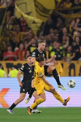Turin, Italy, 16th September 2025. Andrea Cambiaso of Juventus looks on as team mate Teun Koopmeiners of Juventus clashes with Marcel Sabitzer of Borussia Dortmund during the Juventus vs Borussia Dortmund UEFA Champions League match at Allianz Stadium, Turin. Picture credit should read: Jonathan Moscrop Sportimage EDITORIAL USE ONLY. No use with unauthorised audio, video, data, fixture lists, club league logos or live services. Online in-match use limited to 120 images, no video emulation. No use in betting, games or single club league player publications. SPI_162_JM_JUVE_BORUSSIA_ SPI-4122-0162