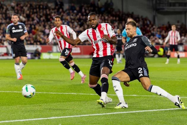 16th September 2025; Gtech Community Stadium, Brentford, London, England; Carabao Cup Football, Brentford versus Aston Villa; Matty Cash of Aston Villa tackles Dango Ouattara of Brentford  IanxStephen