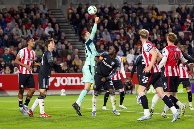 16th September 2025; Gtech Community Stadium, Brentford, London, England; Carabao Cup Football, Brentford versus Aston Villa; H& xe1;kon Rafn Valdimarsson of Brentford punches the ball away from his goal  IanxStephen