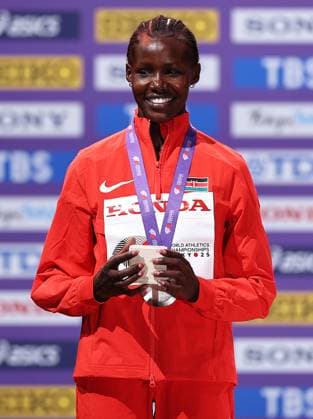 (250917) -- TOKYO, Sept. 17, 2025 -- Silver medalist Dorcus Ewoi of Kenya is seen during the women s 1500m awarding ceremony at the 2025 World Athletics Championships in Tokyo, Japan, Sept. 17, 2025. ) (SP)JAPAN-TOKYO-ATHLETICS-WORLD ATHLETICS CHAMPIONSHIPS-WOMEN S 1500M-AWARDING CEREMONY JiaxHaocheng 
