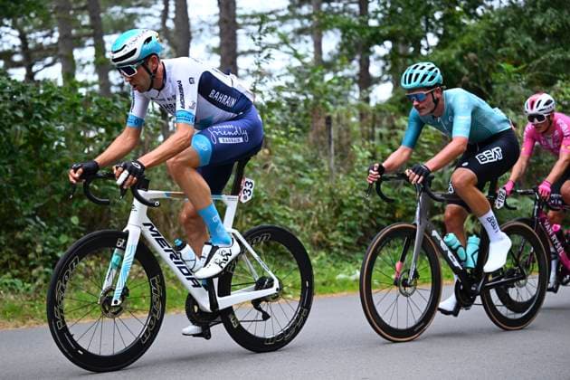 Grand Prix de Wallonie 2025 Cycling Race NAMUR, BELGIUM - SEPTEMBER 17 : Gradek Kamil (POL) of Bahrain - Victorious, Dissel Bram (NED) of BEAT Cycling Club during the 66th edition of Grand Prix de Wallonie an UCI ProSeries 1.Pro one day cycling road race for Men Elite of 187 km with start in Dison and finish in Citadelle de Namur on September 17, 2025 in Namur, Belgium, 17 09 2025 ( Motordriver Stefan Boone - Namur Belgium  Copyright: xVincentxKalutx