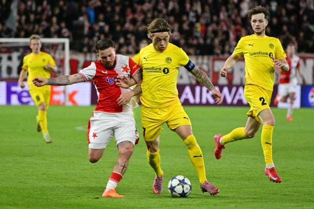 From left Vasil Kusej of Slavia Praha, Patrick Berg of Bodo Glimt in action during the Football Champions League 1st round match Slavia Praha vs Bodo Glimt in Prague, Czech Republic, September 17, 2025. (CTKxPhoto VitxSimanek) CTKPhotoP2025091707998  CTKPhotoP2025091707998