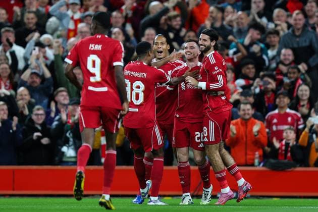 Liverpool, England, 17th September 2025. Andrew Robertson of Liverpool celebrates his goal to make it 1-0 during the Liverpool vs Atletico Madrid UEFA Champions League match at Anfield, Liverpool. Picture credit should read: James Baylis Sportimage EDITORIAL USE ONLY. No use with unauthorised audio, video, data, fixture lists, club league logos or live services. Online in-match use limited to 120 images, no video emulation. No use in betting, games or single club league player publications. SPI_024_JB_LIV_ATM_ SPI-4140-0024